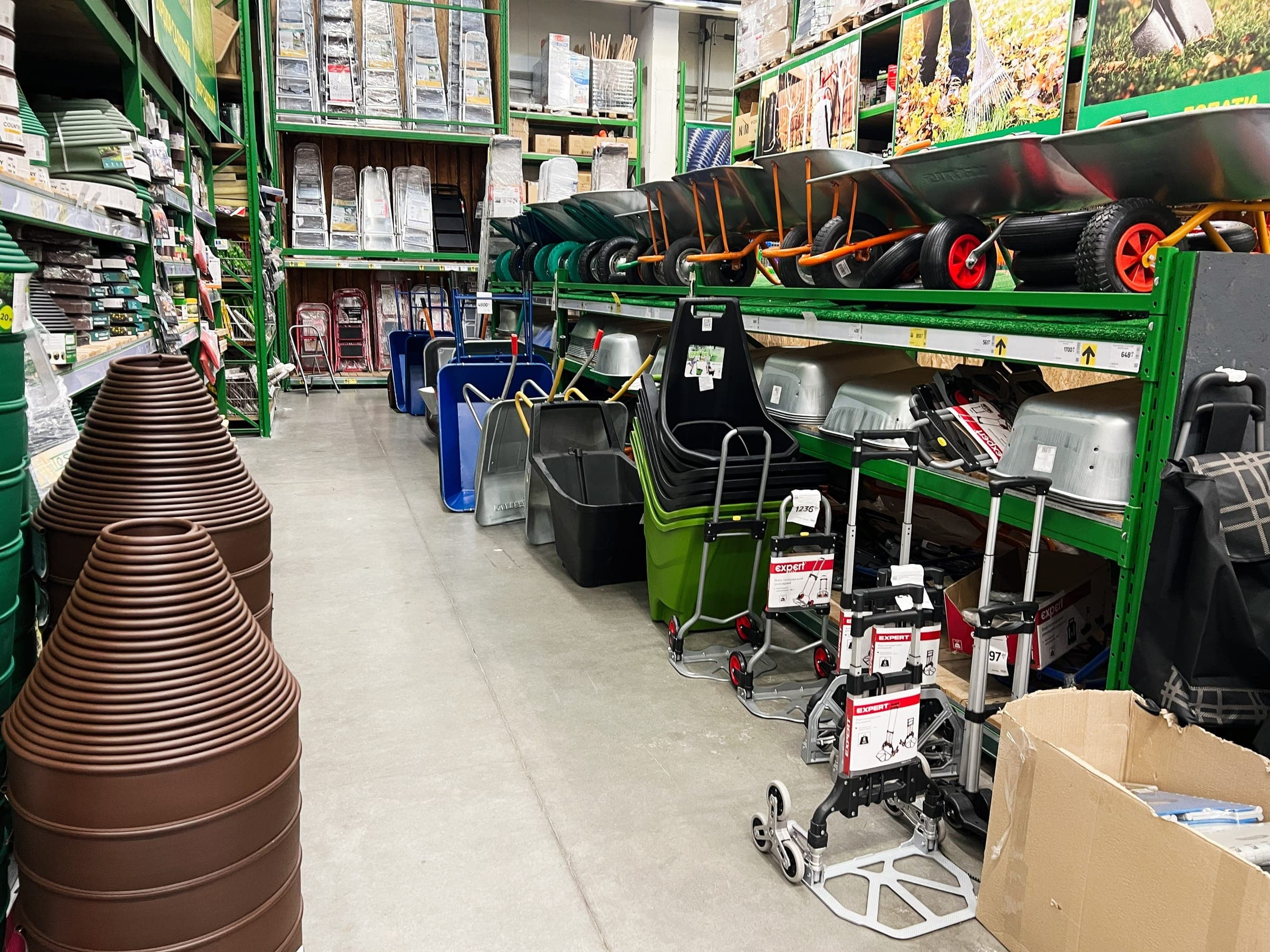 Aisle of wheelbarrows and garden supplies